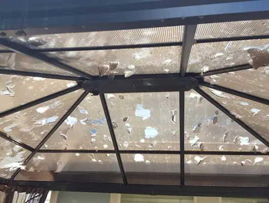 Hail Storm Damage to a Competitor's Gazebo: Poorly UV protected Polycarbonate panels become brittle after 2 years or more in the sun and become unable to withstand high impact.